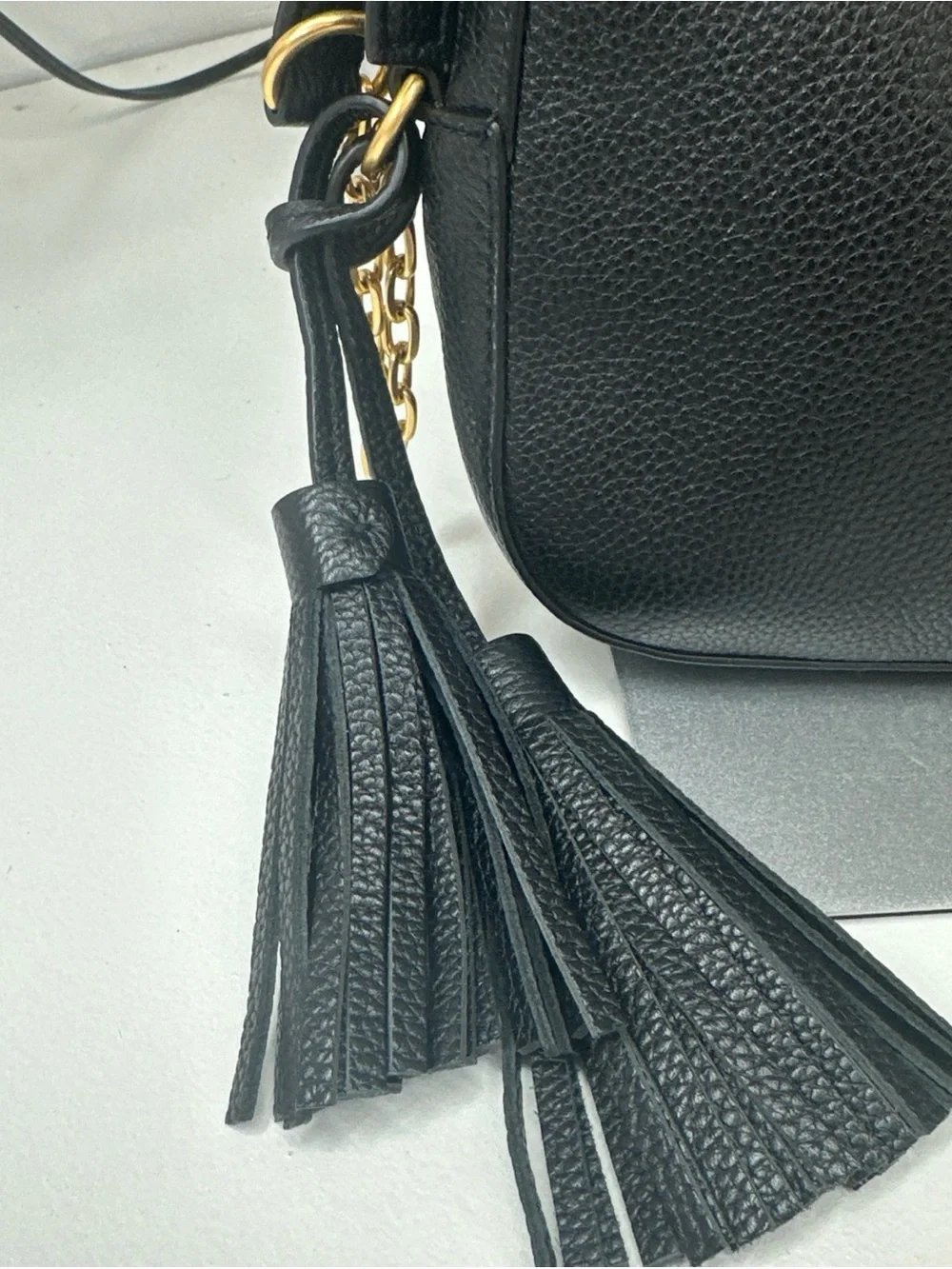 Tory Burch McGraw Crossbody tassle bag black pebbled leather Double T logo.